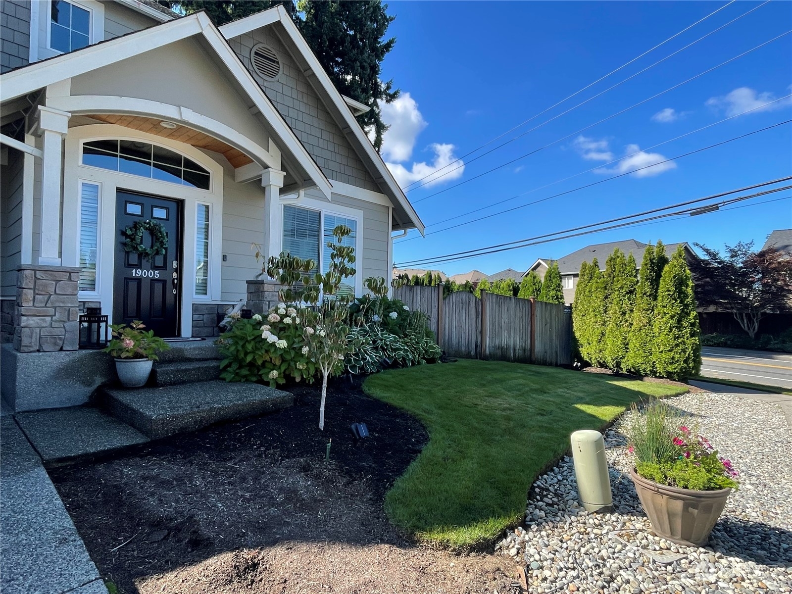19005 Grannis Road Bothell, WA 98012 - Photo 28 of 31 a front view of a house with garden