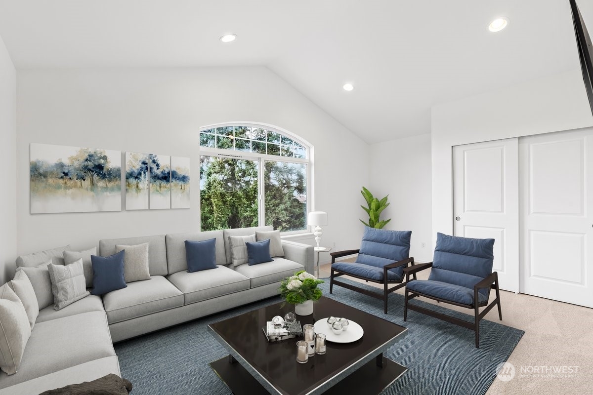 19005 Grannis Road Bothell, WA 98012 - Photo 10 of 31 a living room with furniture and a large window