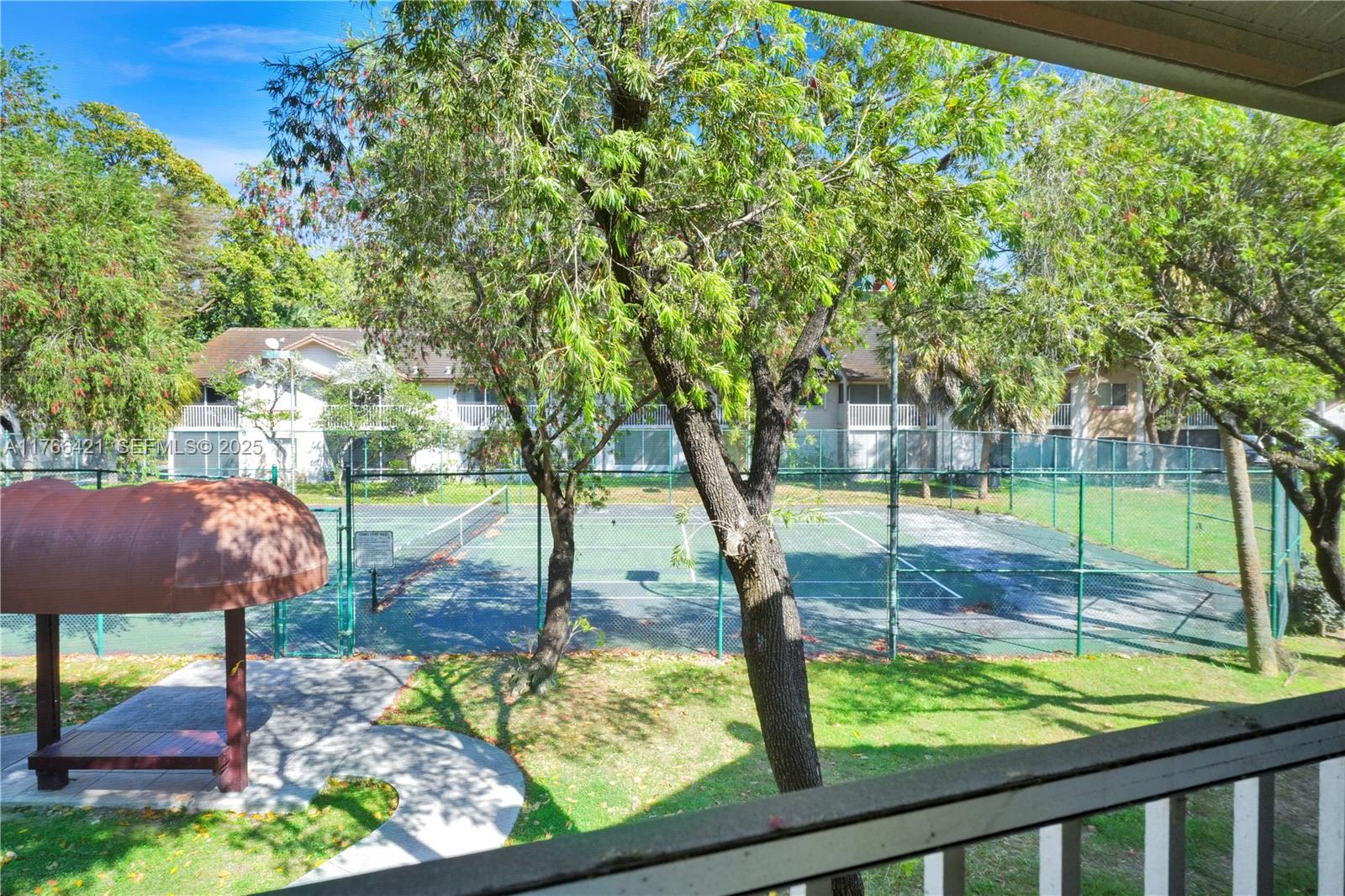 9503 Southwest 140th Court, Unit 9503 Miami, FL 33186 - Photo 14 of 32 a view of yard with tree s