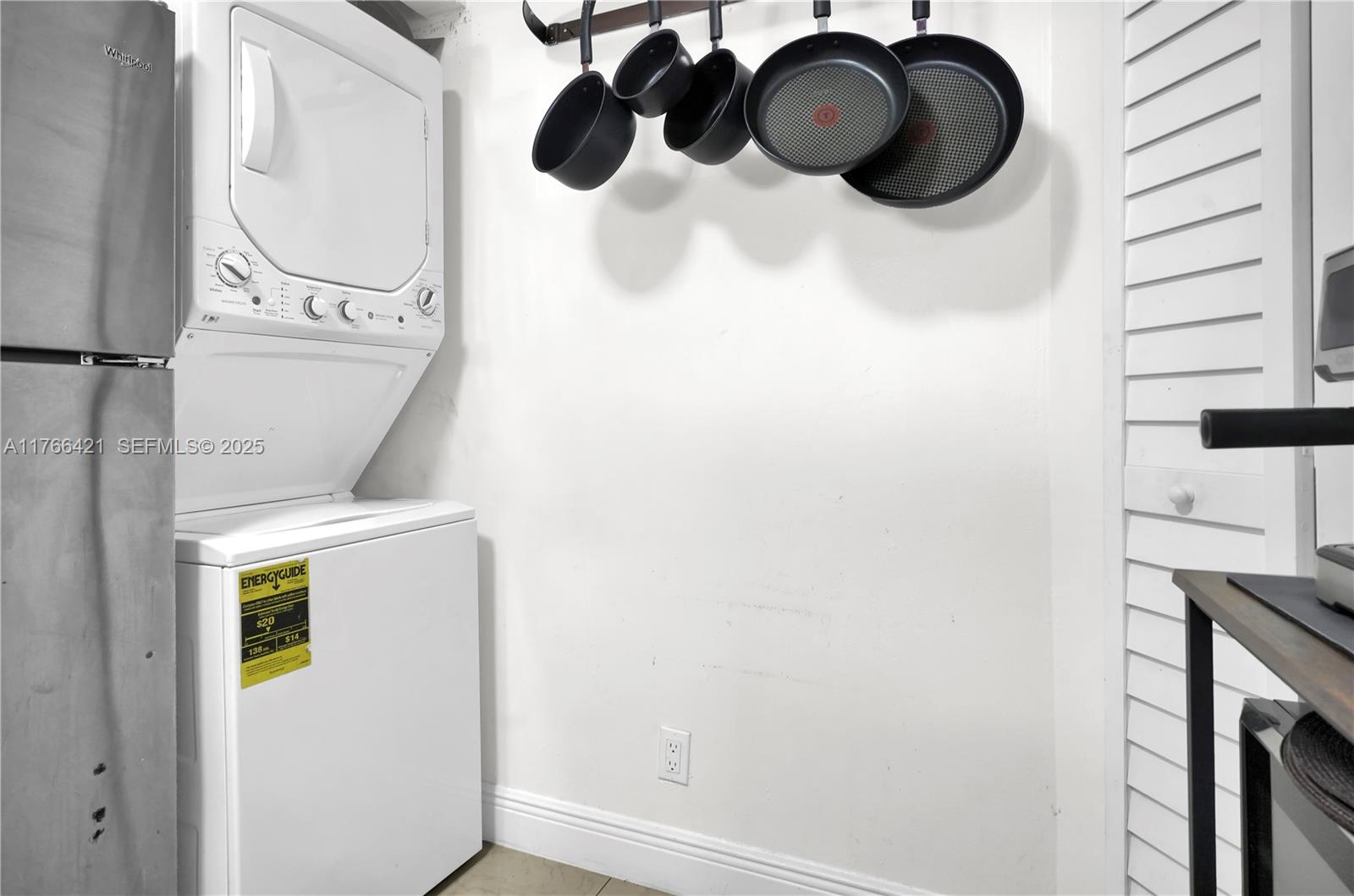 9503 Southwest 140th Court, Unit 9503 Miami, FL 33186 - Photo 8 of 32 a bathroom with a sink and a mirror