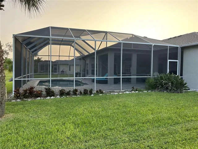 a view of a garden and basketball court