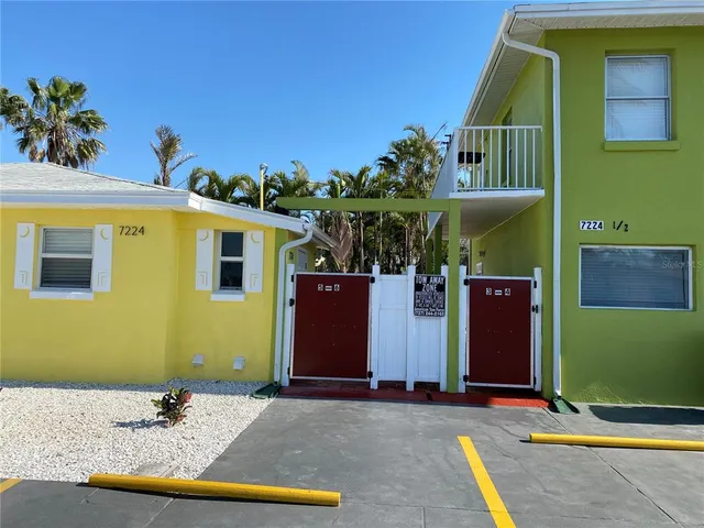 a view of a house with a swimming pool
