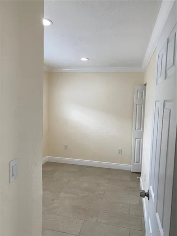 an empty room with a natural light