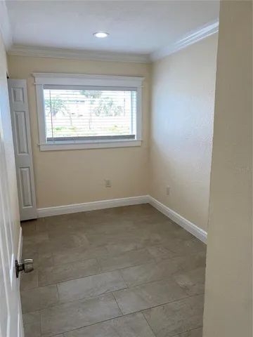 a view of a window in an empty room