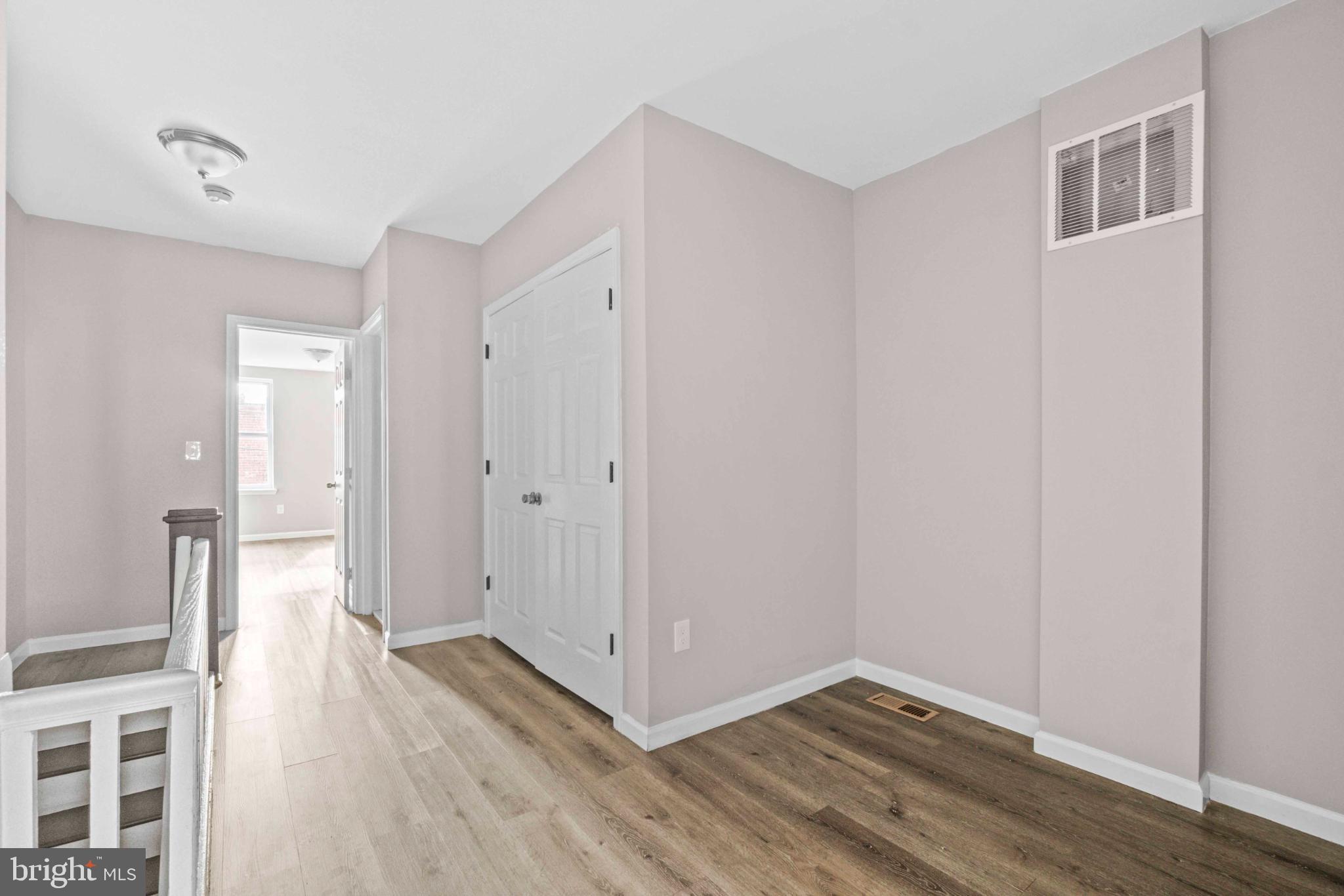 2815 East Madison Street Baltimore, MD 21205 - Photo 10 of 25 Bright and airy hallway with modern charm.