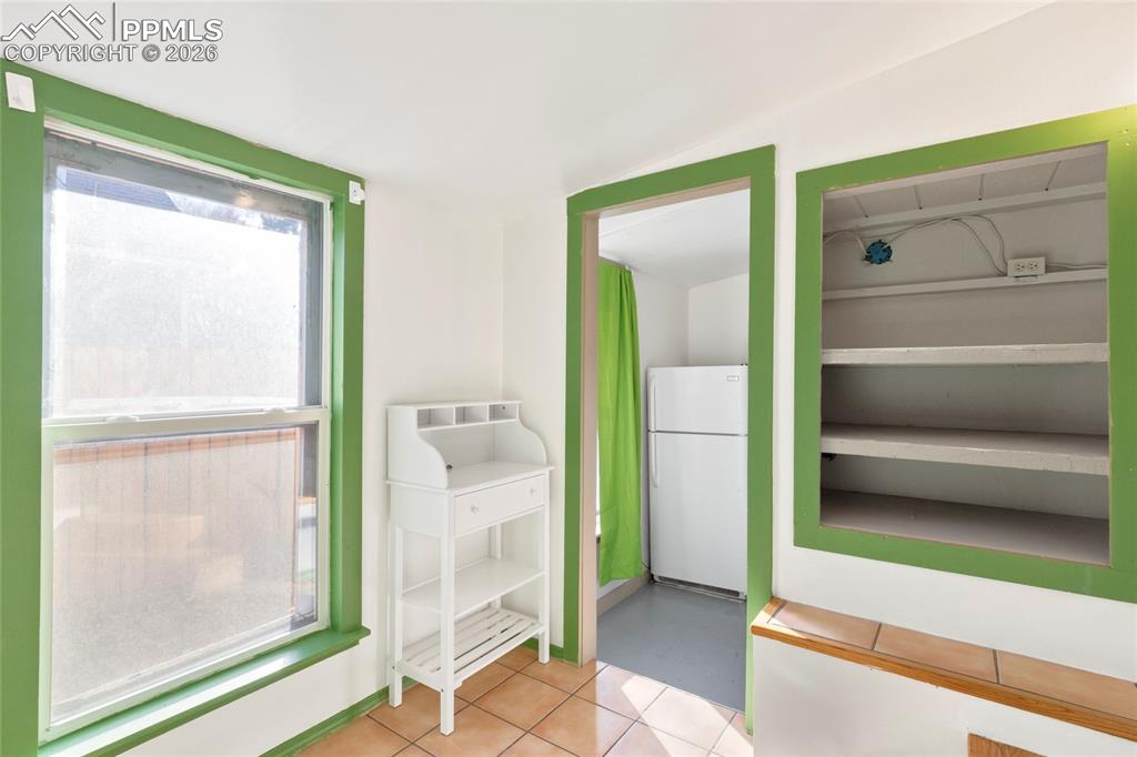2620 Main Street Colorado Springs, CO 80907 - Photo 11 of 28 a view of a bathroom with a glass door