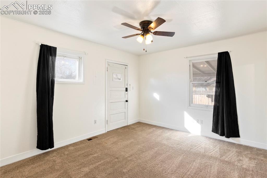 2620 Main Street Colorado Springs, CO 80907 - Photo 15 of 28 a view of a livingroom with a ceiling fan and window