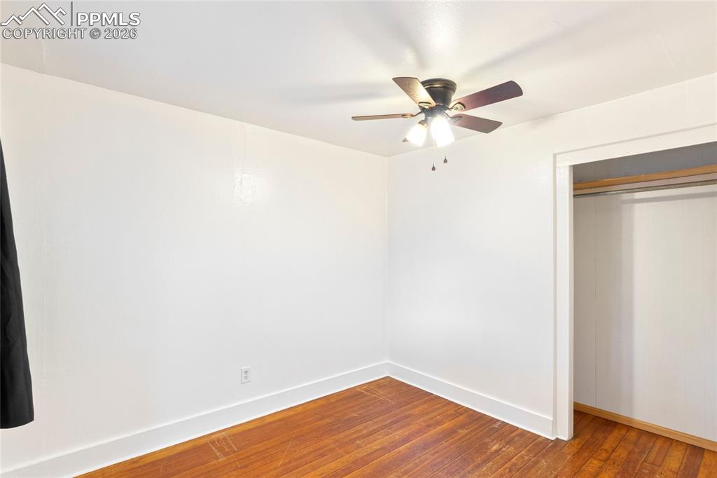 2620 Main Street Colorado Springs, CO 80907 - Photo 16 of 28 a view of a room with wooden floor