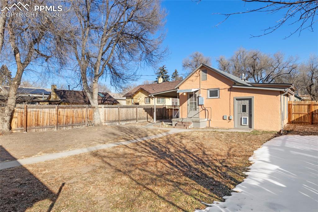 2620 Main Street Colorado Springs, CO 80907 - Photo 25 of 28 a front view of a house with a yard