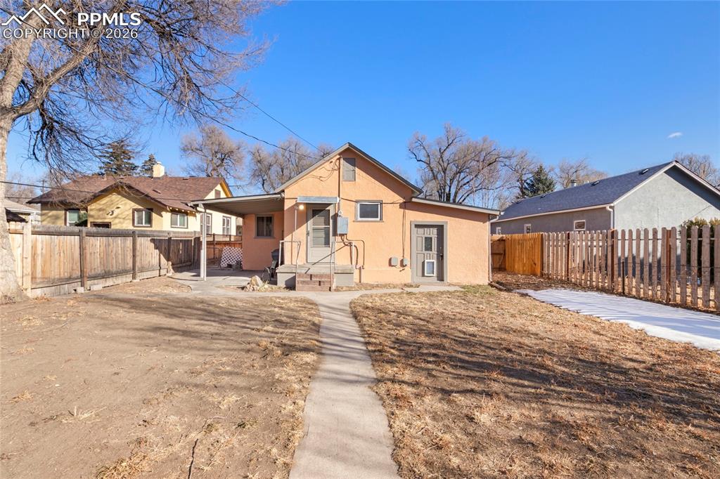 2620 Main Street Colorado Springs, CO 80907 - Photo 28 of 28 a front view of a house with a yard
