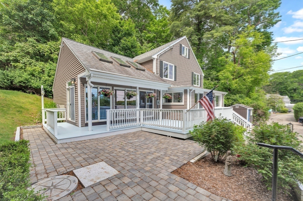 118 Woolford Road Wrentham, MA 02093 - Photo 36 of 41 a house with trees in the background