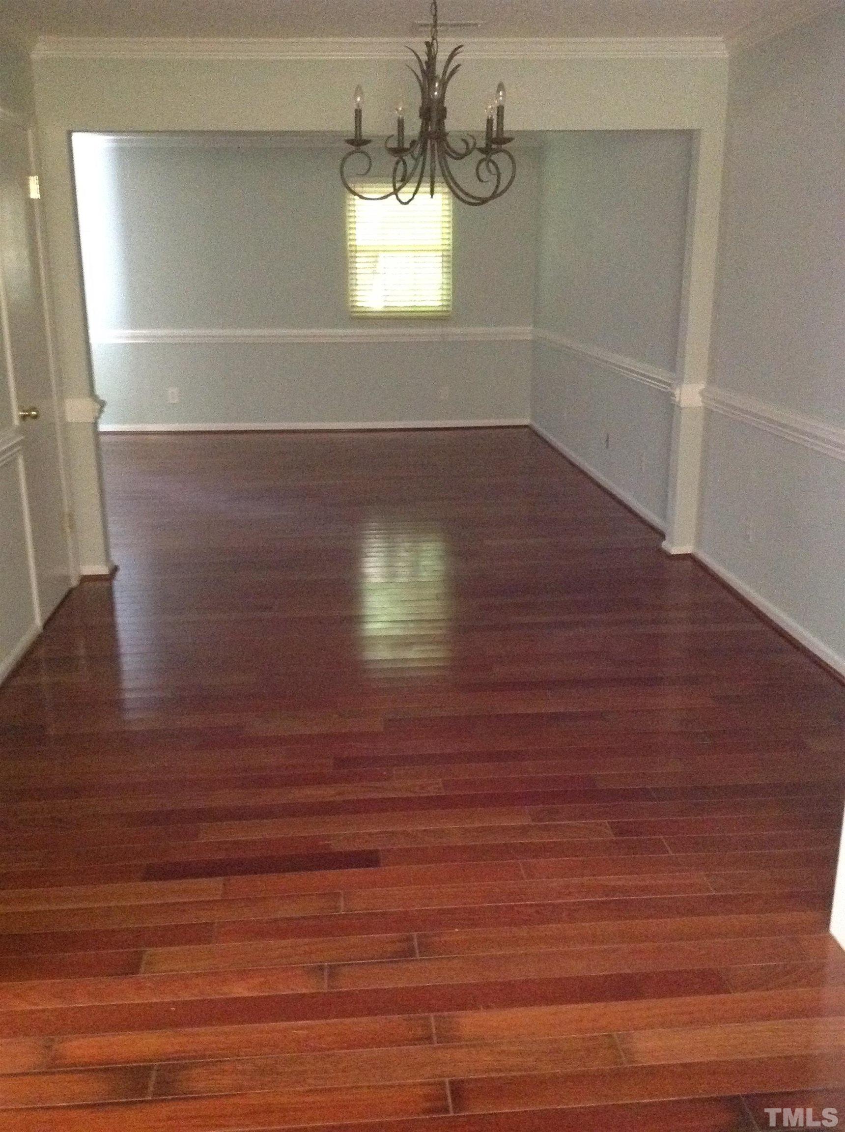 6325 New Market Way, Unit 6325 Raleigh, NC 27615 - Photo 5 of 13 a view of wooden floor window and wooden floor