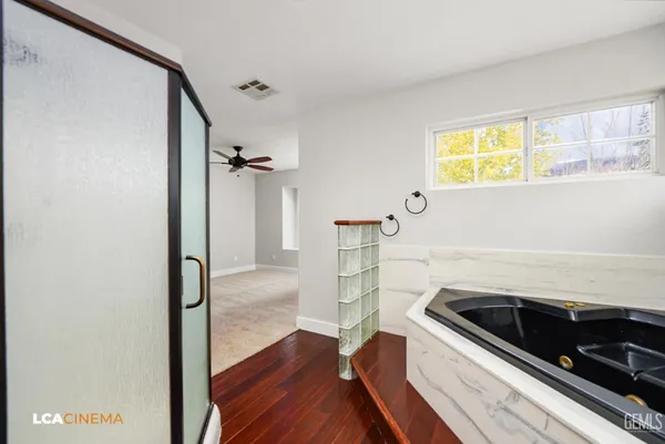a view of a kitchen from the hallway
