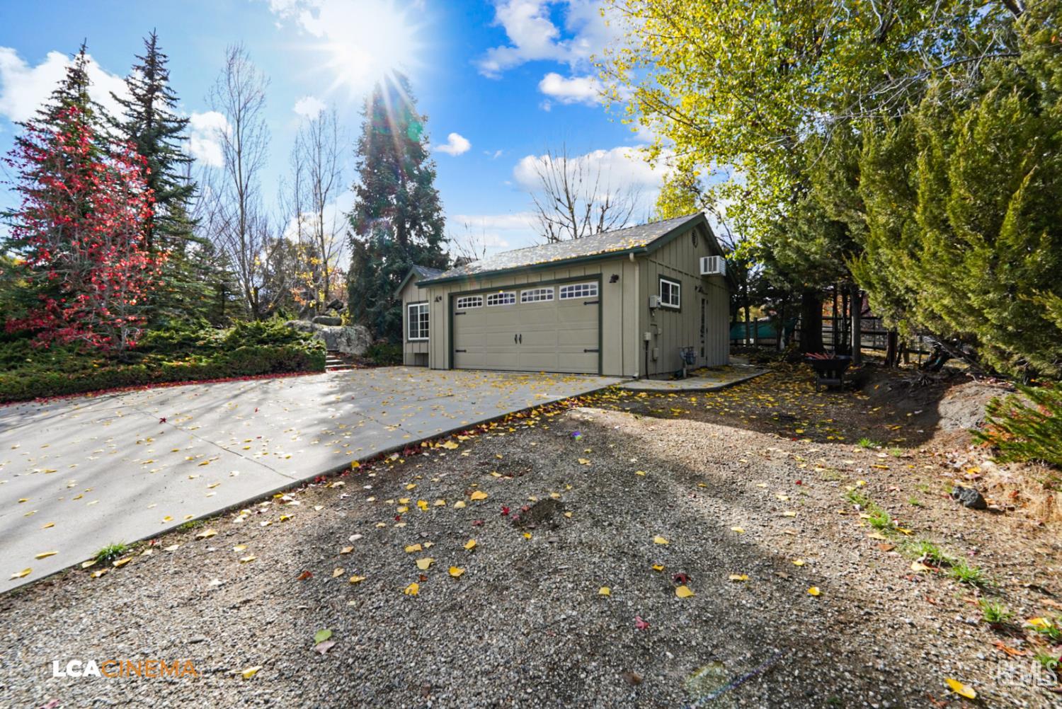 Undisclosed Address Tehachapi, CA 93561 - Photo 19 of 36 a view of a grey house with a yard