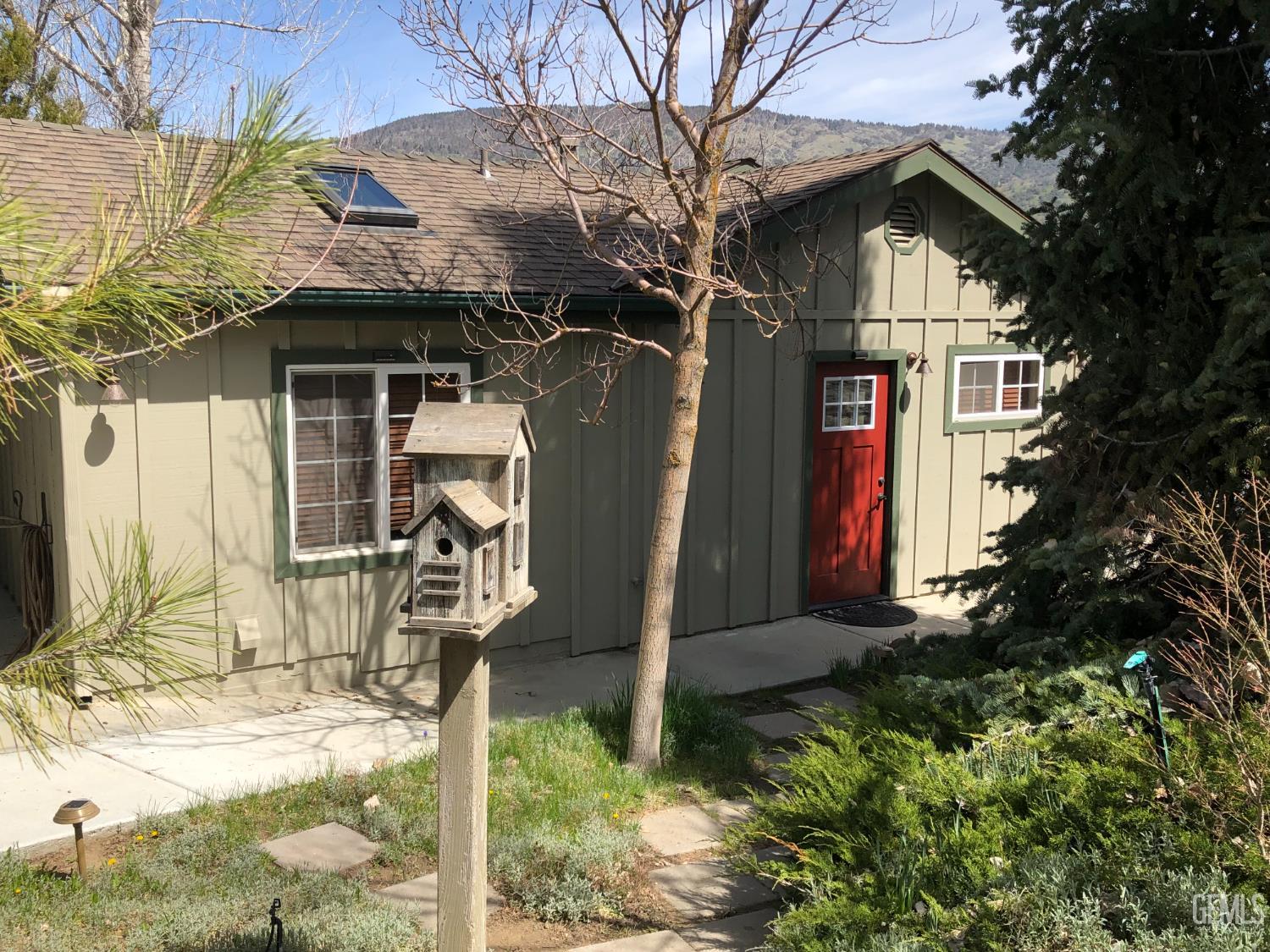 Undisclosed Address Tehachapi, CA 93561 - Photo 21 of 36 a view of a house with a yard and chair