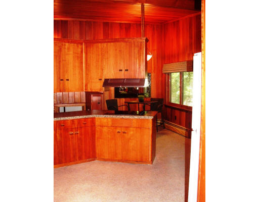 40 Old Post Road Walpole, MA 02032 - Photo 13 of 30 a kitchen with stainless steel appliances a large window and a kitchen view