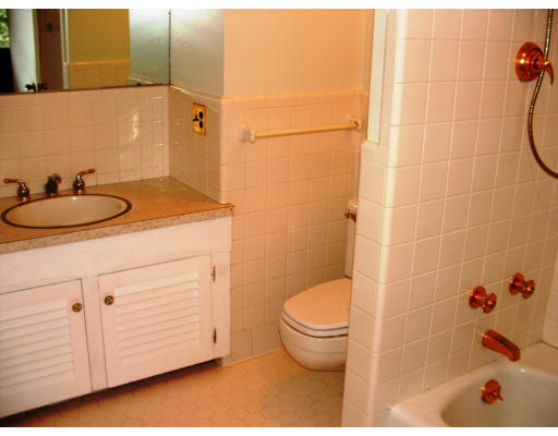 40 Old Post Road Walpole, MA 02032 - Photo 21 of 30 a bathroom with a sink a toilet and shower