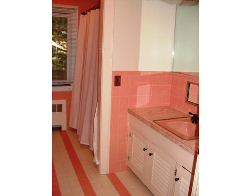 40 Old Post Road Walpole, MA 02032 - Photo 25 of 30 a bathroom with a sink and a mirror
