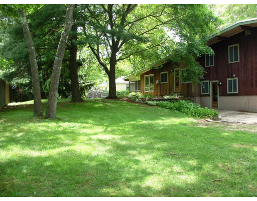 40 Old Post Road Walpole, MA 02032 - Photo 29 of 30 a backyard of a house with seating space