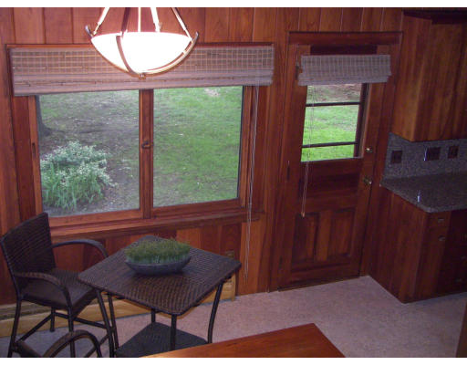 40 Old Post Road Walpole, MA 02032 - Photo 10 of 30 a view of a room with a table and chairs