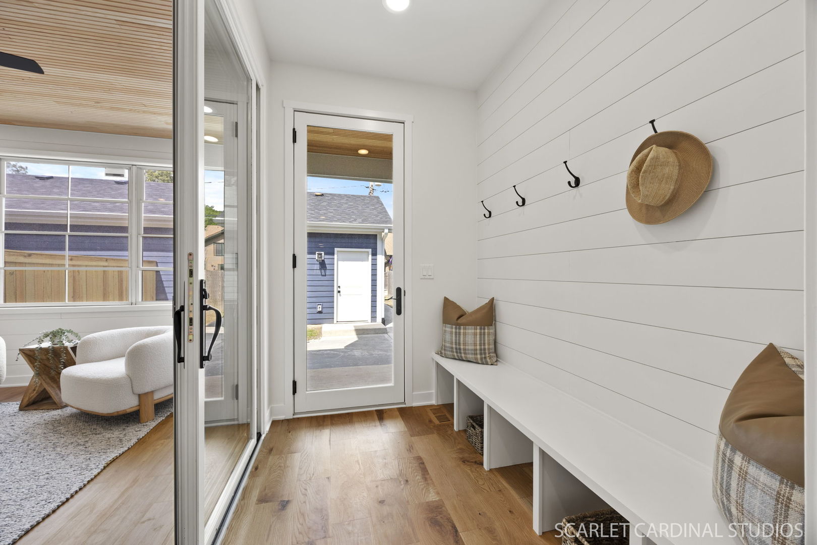 717 North Brainard Street Naperville, IL 60563 - Photo 11 of 49 a view of a livingroom with wooden floor and chair