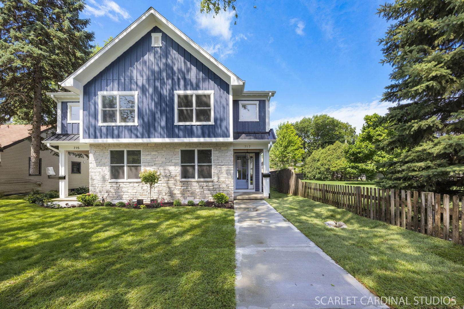 717 North Brainard Street Naperville, IL 60563 - Photo 2 of 49 a front view of a house with a yard table and chairs