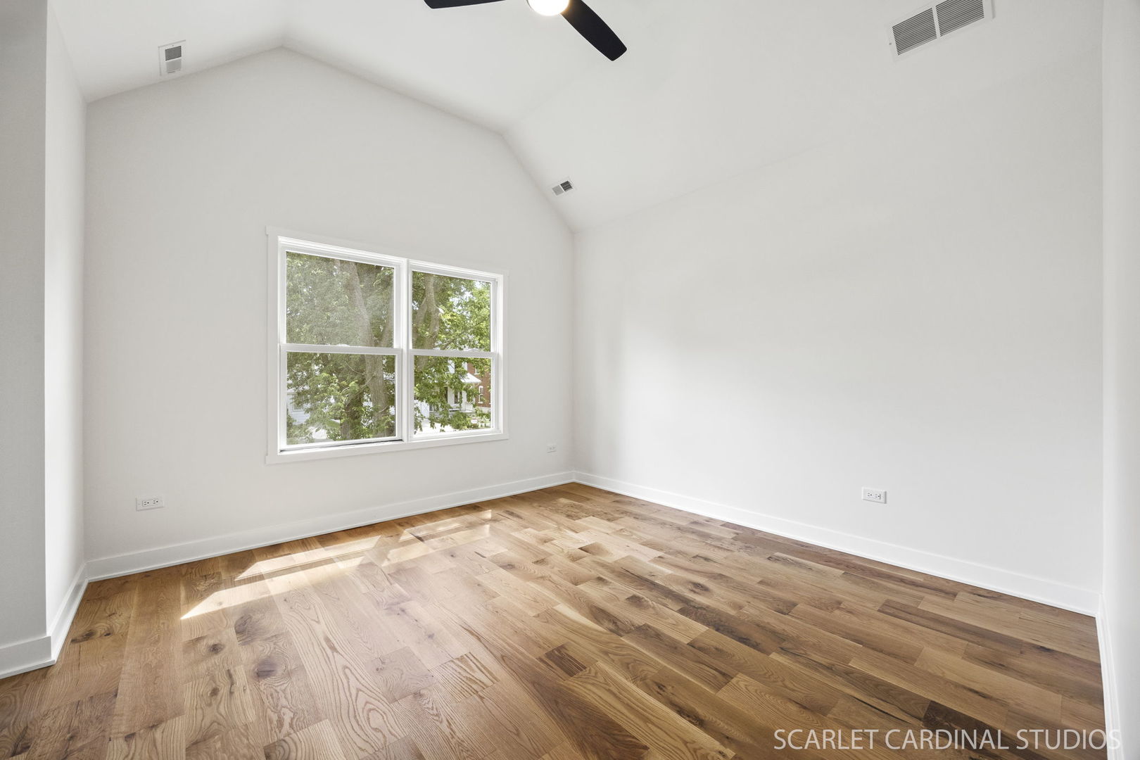 717 North Brainard Street Naperville, IL 60563 - Photo 21 of 49 an empty room with wooden floor and windows