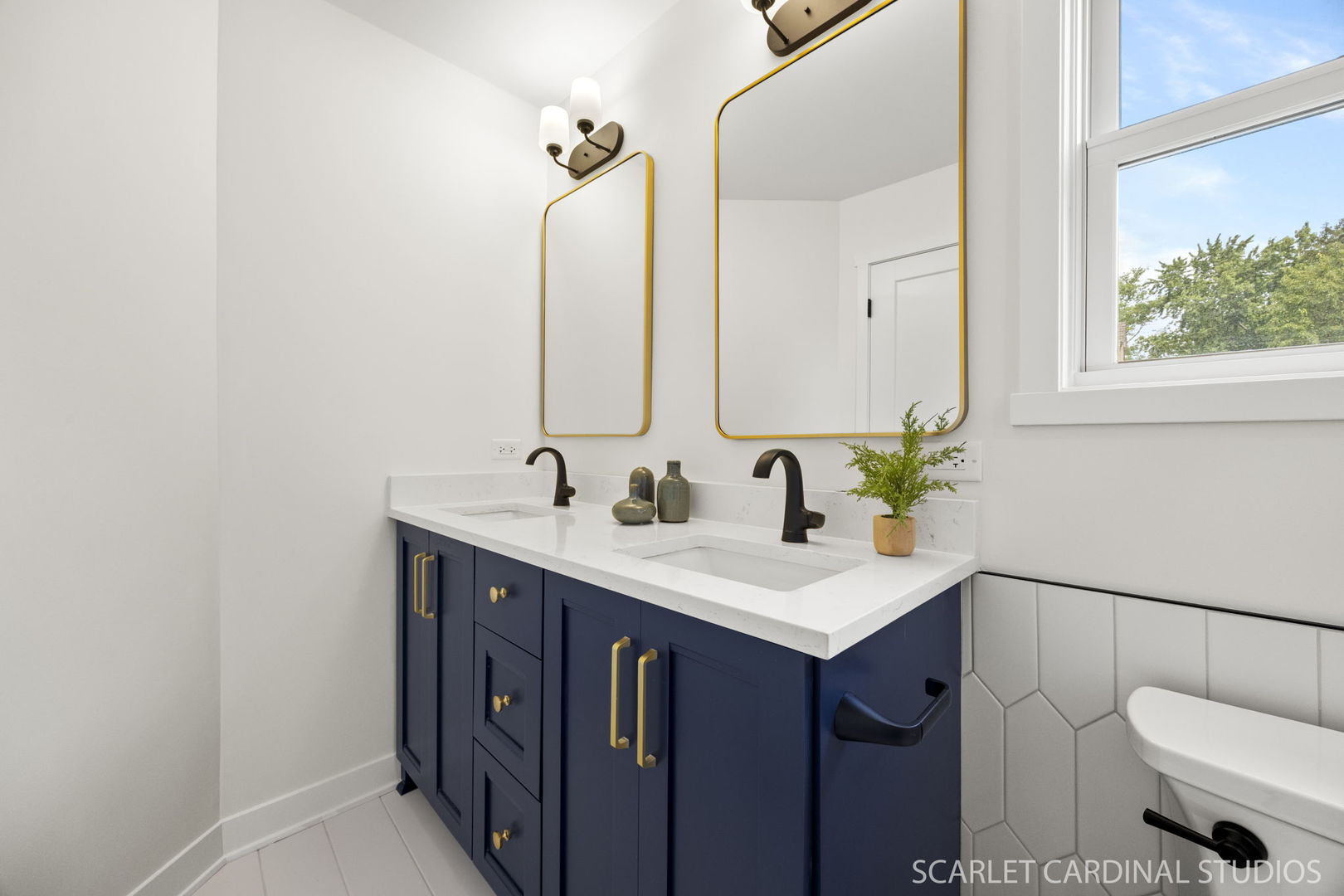 717 North Brainard Street Naperville, IL 60563 - Photo 22 of 49 a bathroom with a sink and a mirror