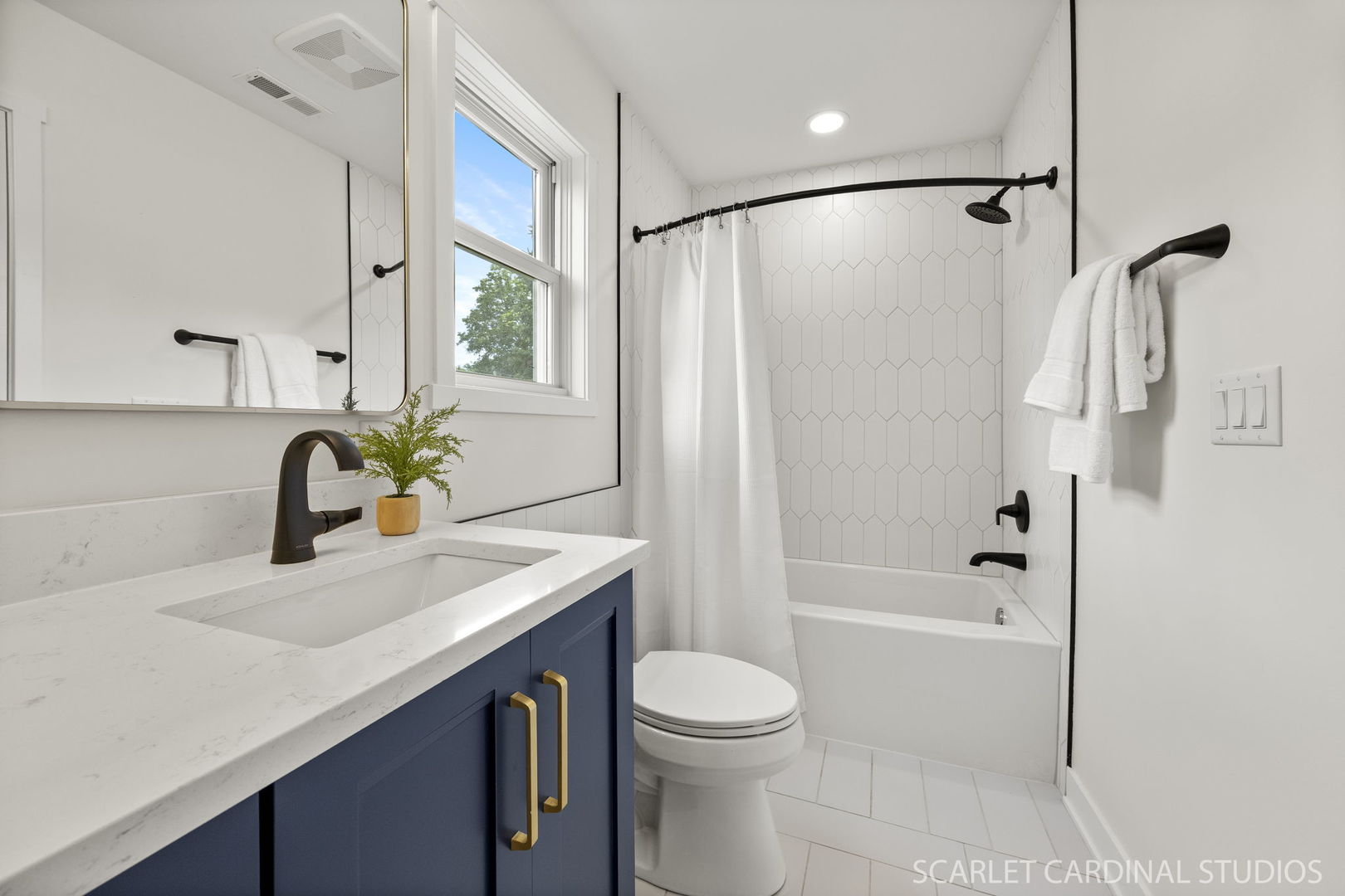 717 North Brainard Street Naperville, IL 60563 - Photo 23 of 49 a bathroom with a sink a toilet and a bathtub