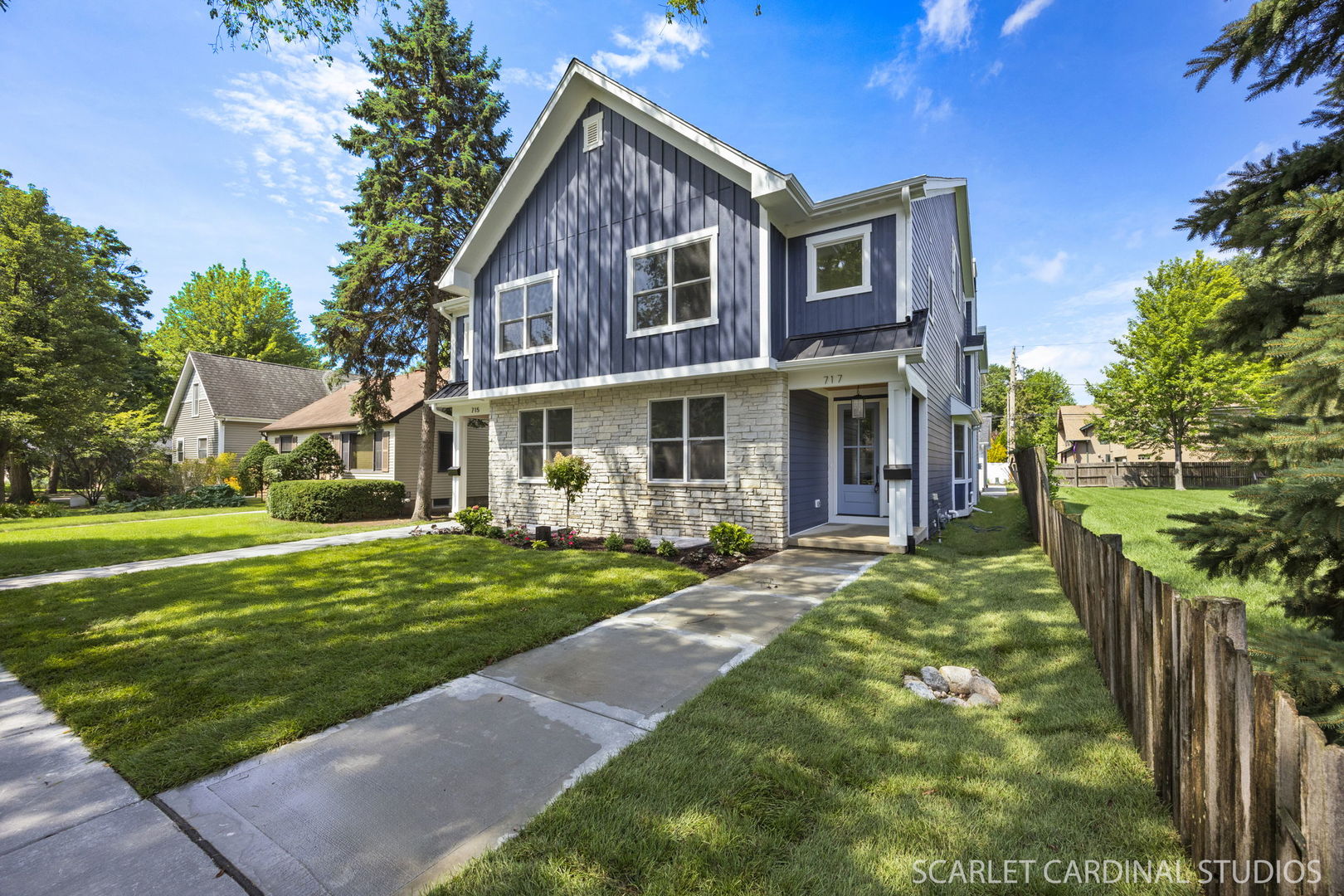 717 North Brainard Street Naperville, IL 60563 - Photo 3 of 49 a front view of a house with a yard table and chairs