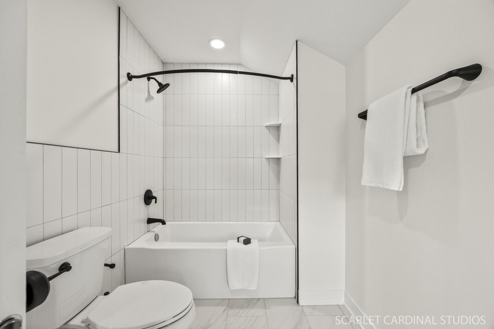 717 North Brainard Street Naperville, IL 60563 - Photo 31 of 49 a bathroom with a toilet shower and a bathtub