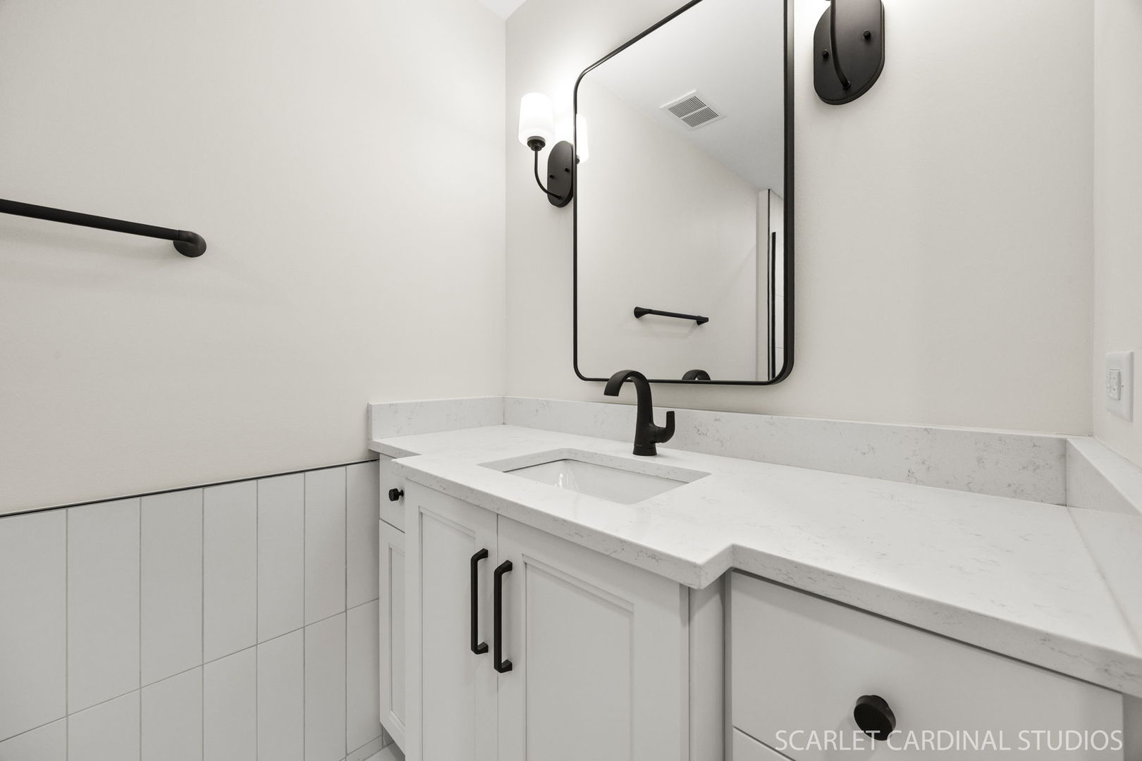 717 North Brainard Street Naperville, IL 60563 - Photo 36 of 49 a bathroom with a granite countertop sink and mirror