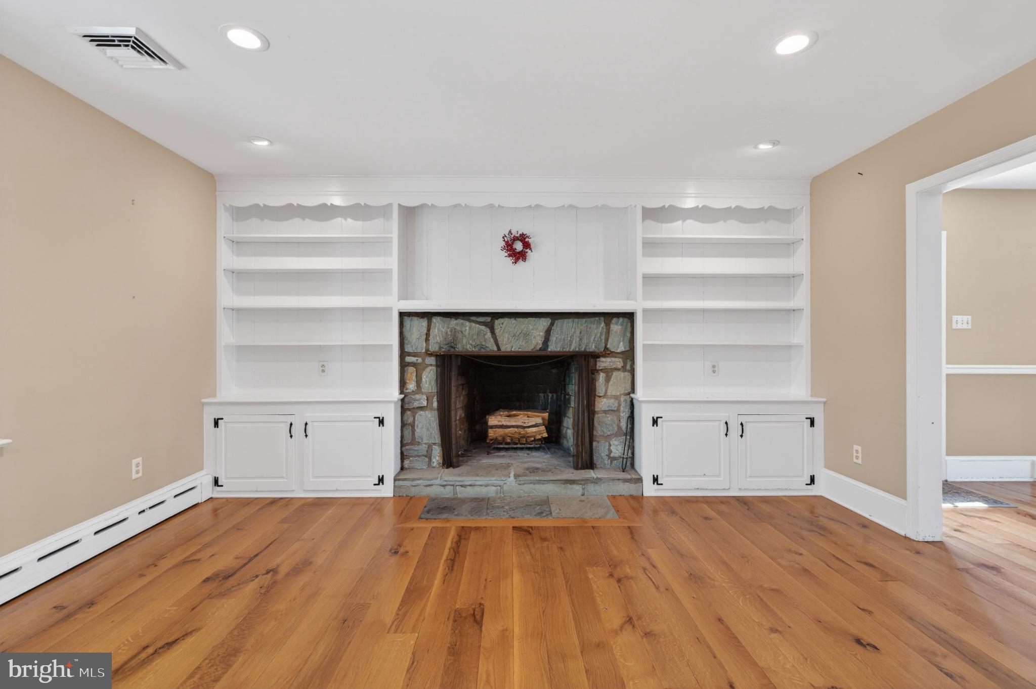 300 Sanatoga Road Pottstown, PA 19465 - Photo 20 of 79 Cozy living space with stone fireplace.