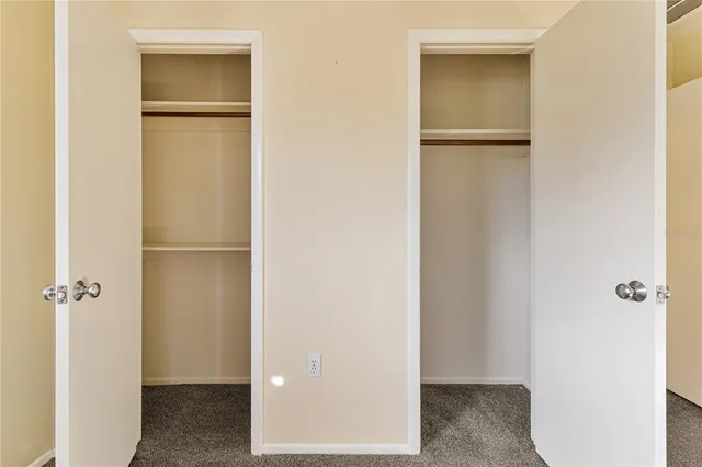 a view of bathroom with a refrigerator