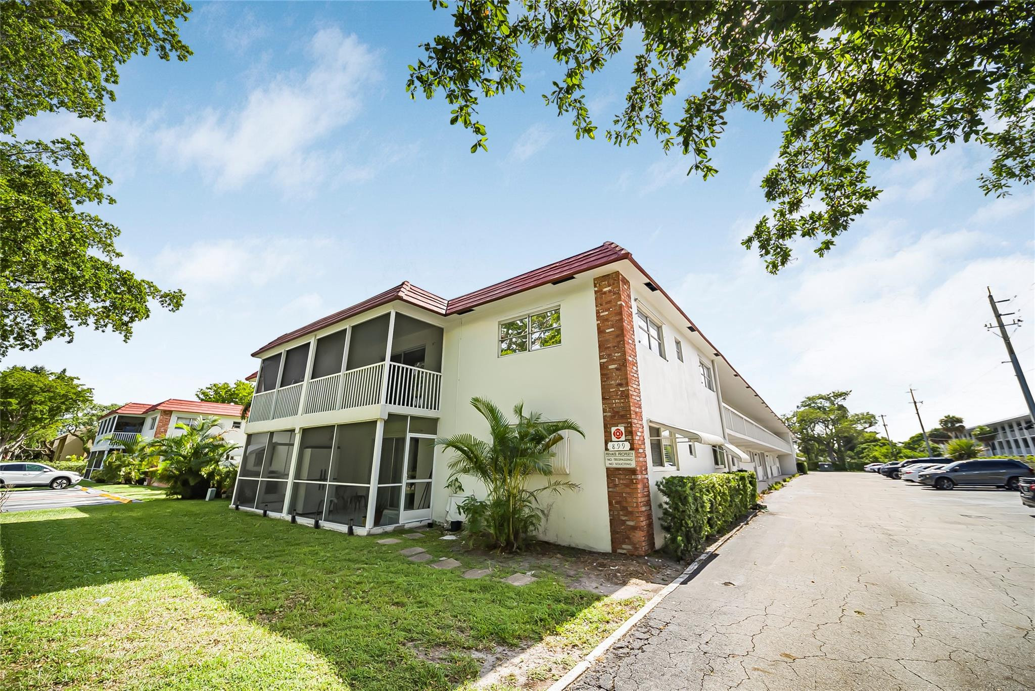 Undisclosed Address Deerfield Beach, FL 33441 - Photo 1 of 26 a view of a house with a yard