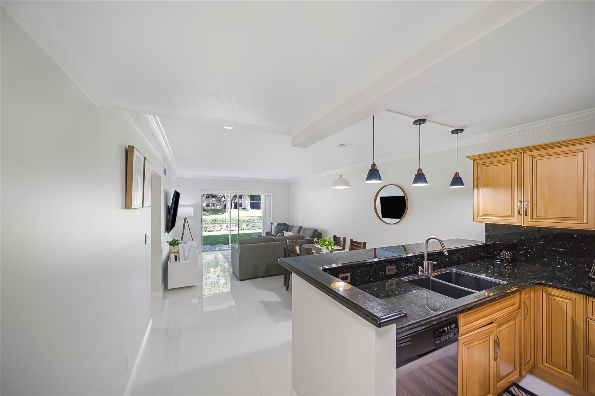 Undisclosed Address Deerfield Beach, FL 33441 - Photo 14 of 26 a kitchen with a sink stove and refrigerator