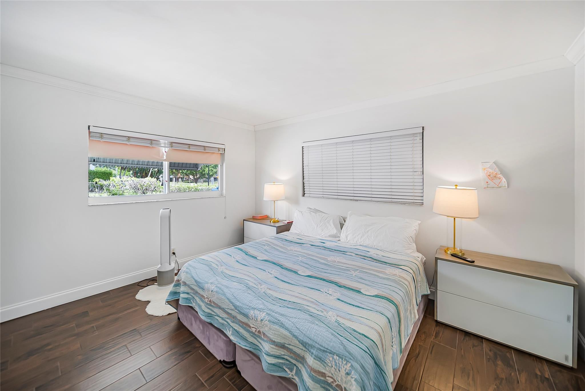 Undisclosed Address Deerfield Beach, FL 33441 - Photo 18 of 26 a bedroom with a bed and a window