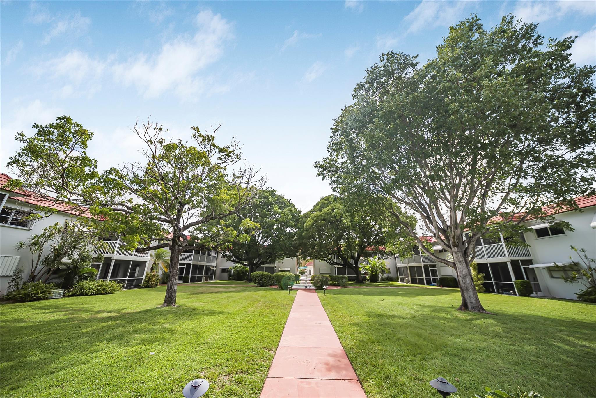 Undisclosed Address Deerfield Beach, FL 33441 - Photo 4 of 26 a view of a park with large trees