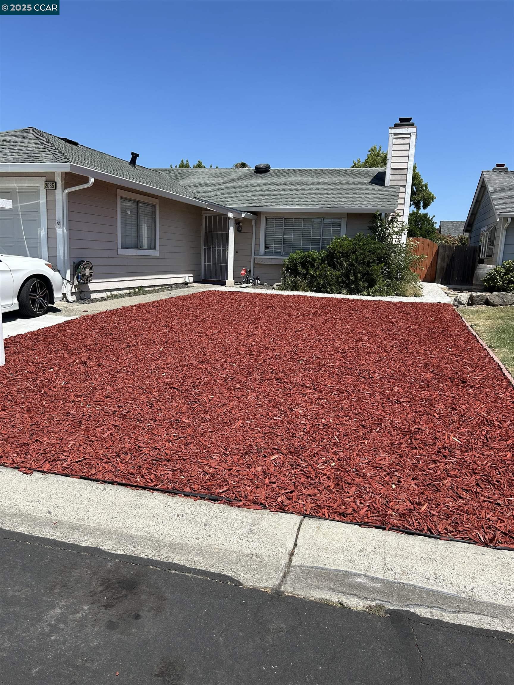 2035 Seward Drive Pittsburg, CA 94565 - Photo 1 of 1 a front view of a house with a yard