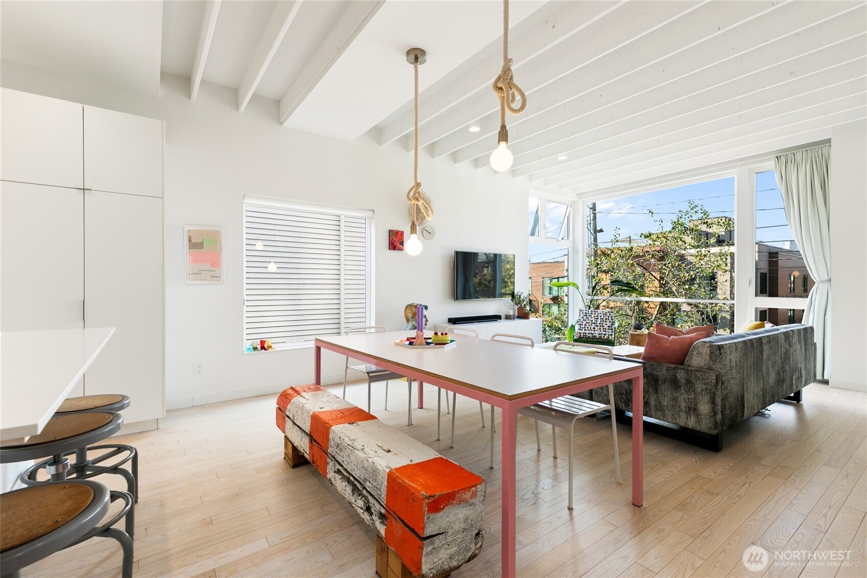 716 16th Avenue, Unit C Seattle, WA 98122 - Photo 14 of 40 a room with furniture and a window