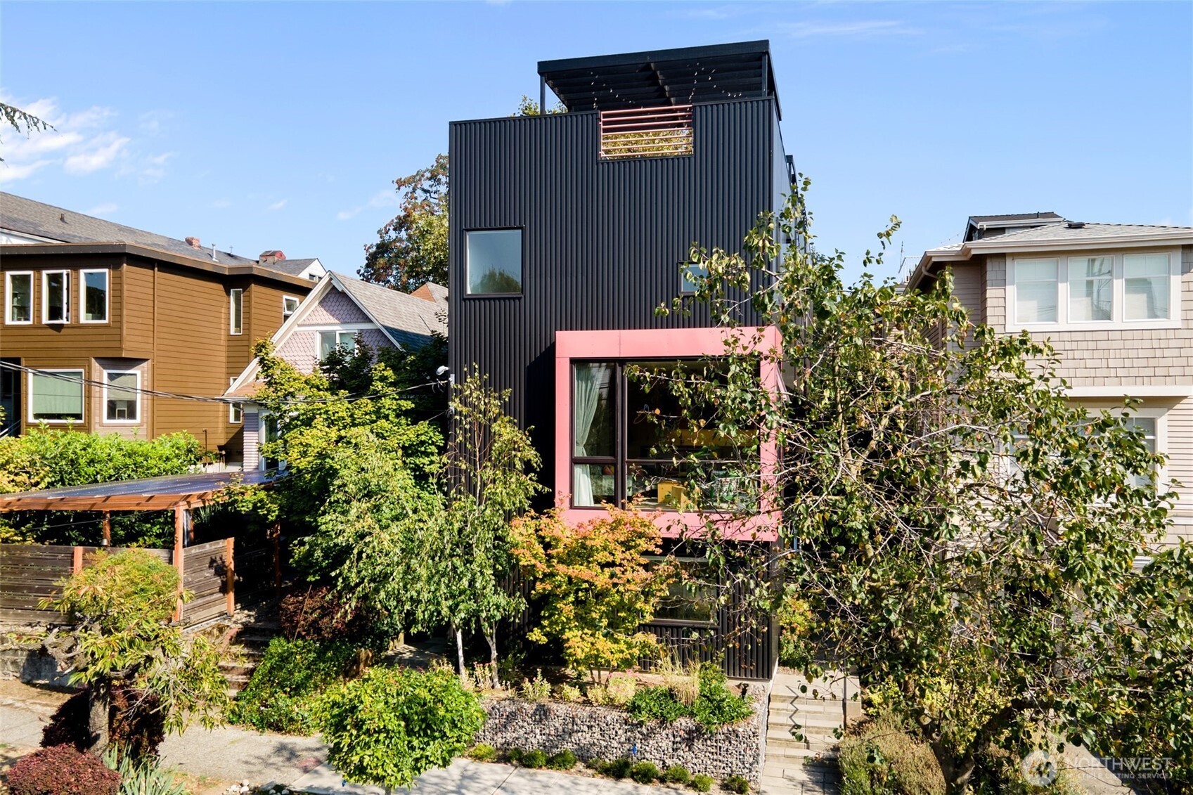 716 16th Avenue, Unit C Seattle, WA 98122 - Photo 36 of 40 front view of a house with a yard