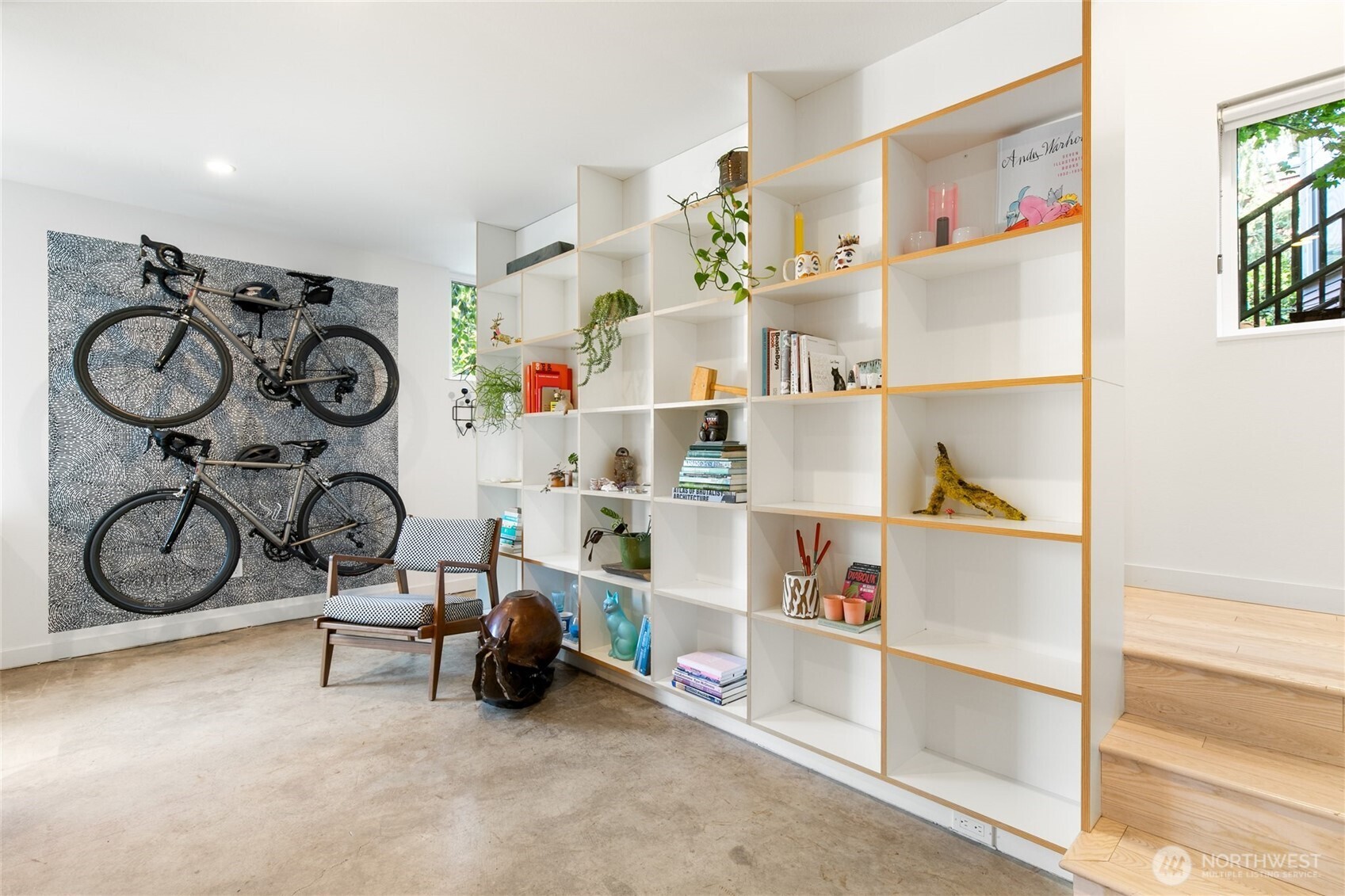 716 16th Avenue, Unit C Seattle, WA 98122 - Photo 4 of 40 a view of storage and utility room with racks on the wall