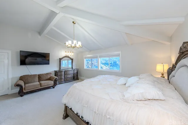 a bathroom with a bathtub and a window