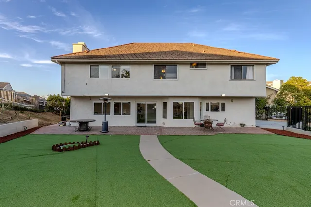 a view of a park with many windows