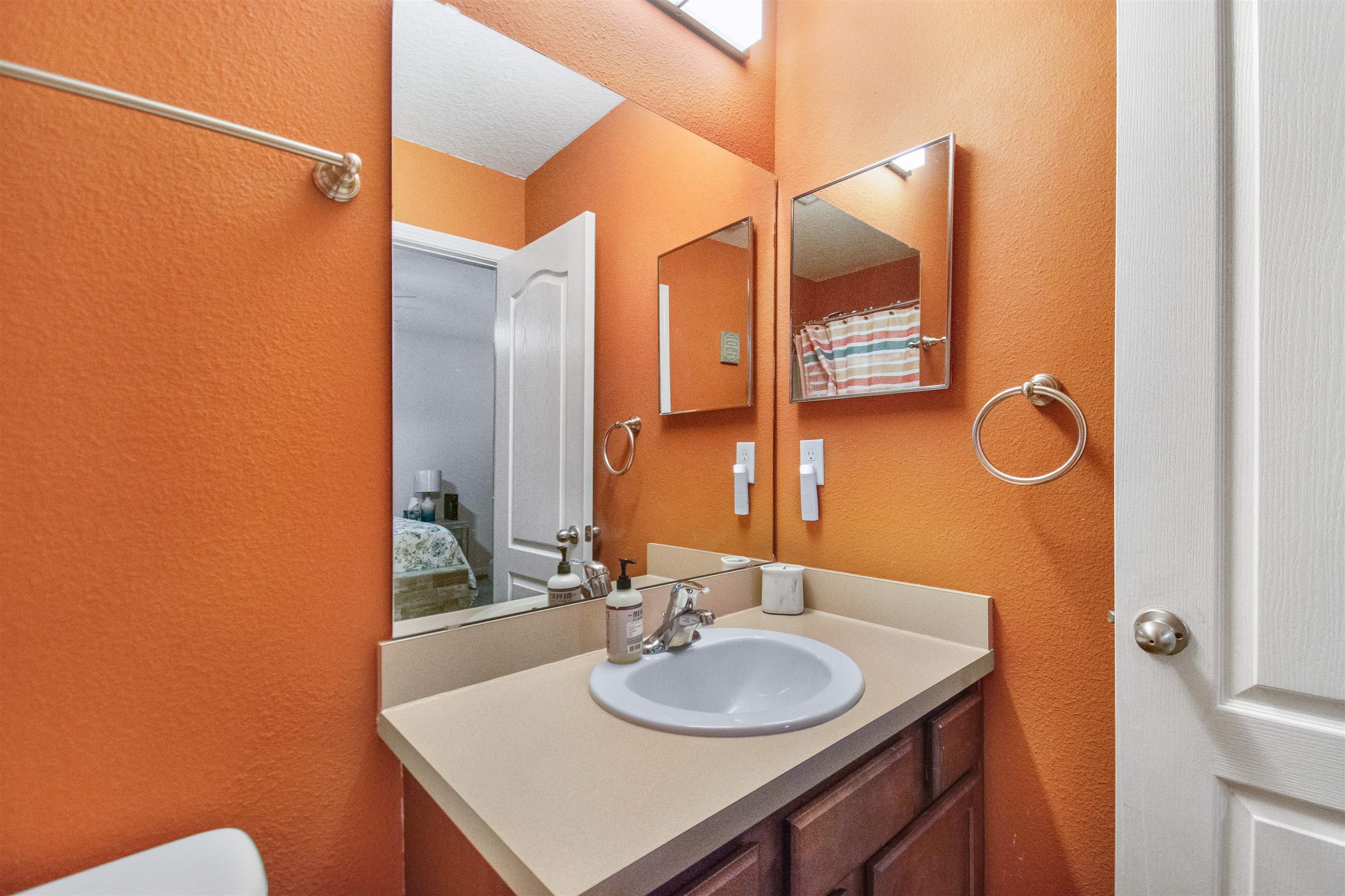 39 Whitland Way St. Augustine, FL 32086 - Photo 16 of 29 a bathroom with a sink and a mirror