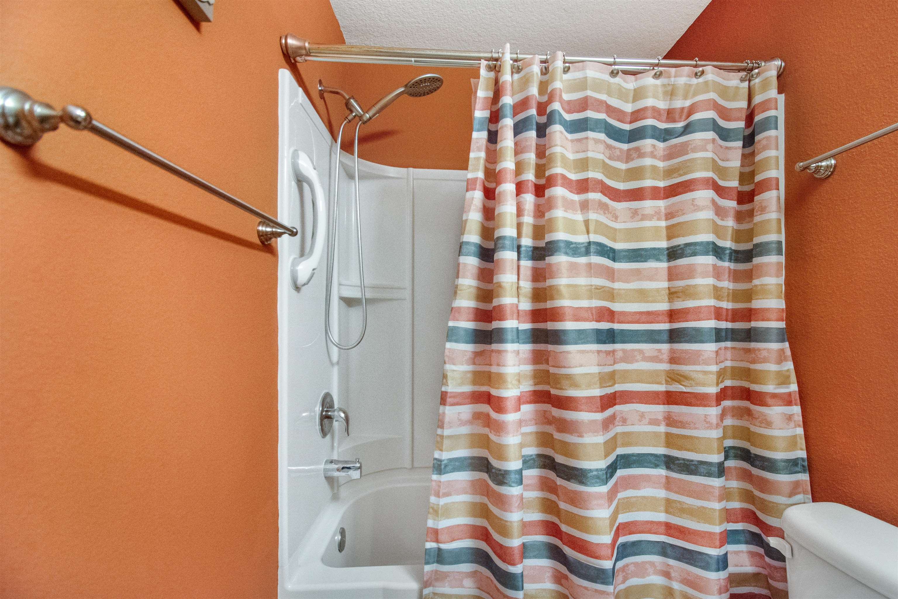 39 Whitland Way St. Augustine, FL 32086 - Photo 17 of 29 a bathroom with a shower curtain and a sink