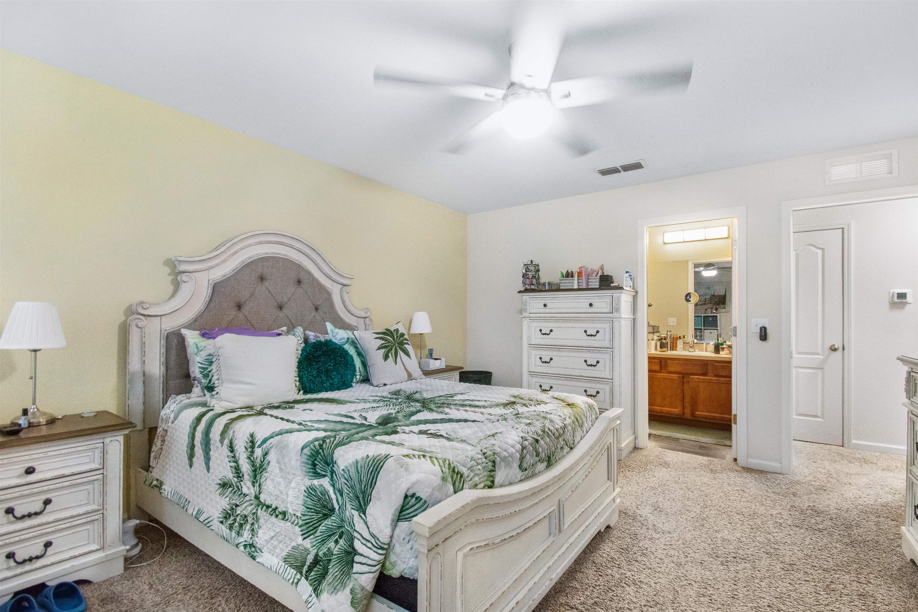 39 Whitland Way St. Augustine, FL 32086 - Photo 20 of 29 a bed sitting in a bedroom and a dresser