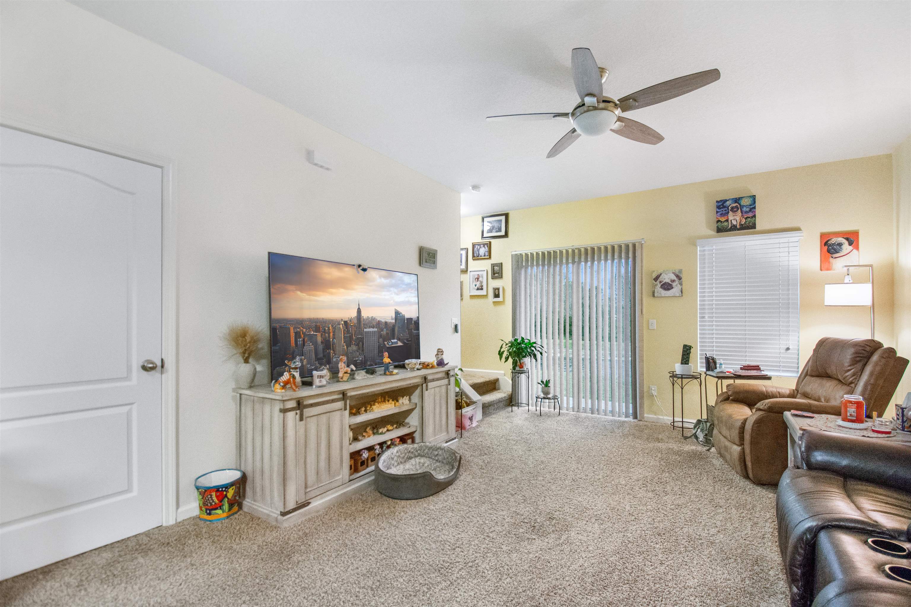 39 Whitland Way St. Augustine, FL 32086 - Photo 9 of 29 a living room with furniture and a flat screen tv