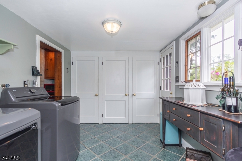 449 Stamets Road Milford, NJ 08848 - Photo 21 of 44 a room with a sink cabinets and a window