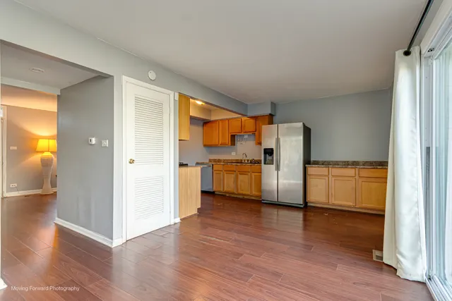 a view of cabinets and wooden floor
